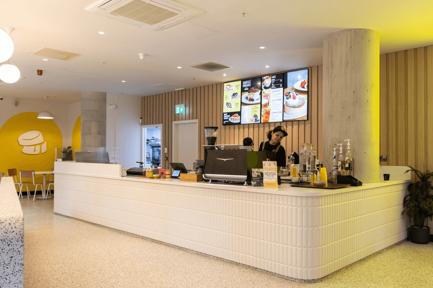 Fluffy Fluffy QSR service counter with staff printing labels